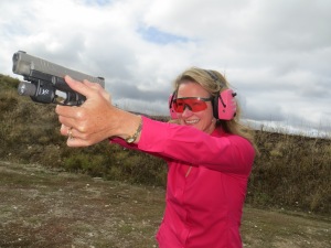 Lynn Sherwood, founder of High Caliber Women shooting her Springfield Armory XDM 45.